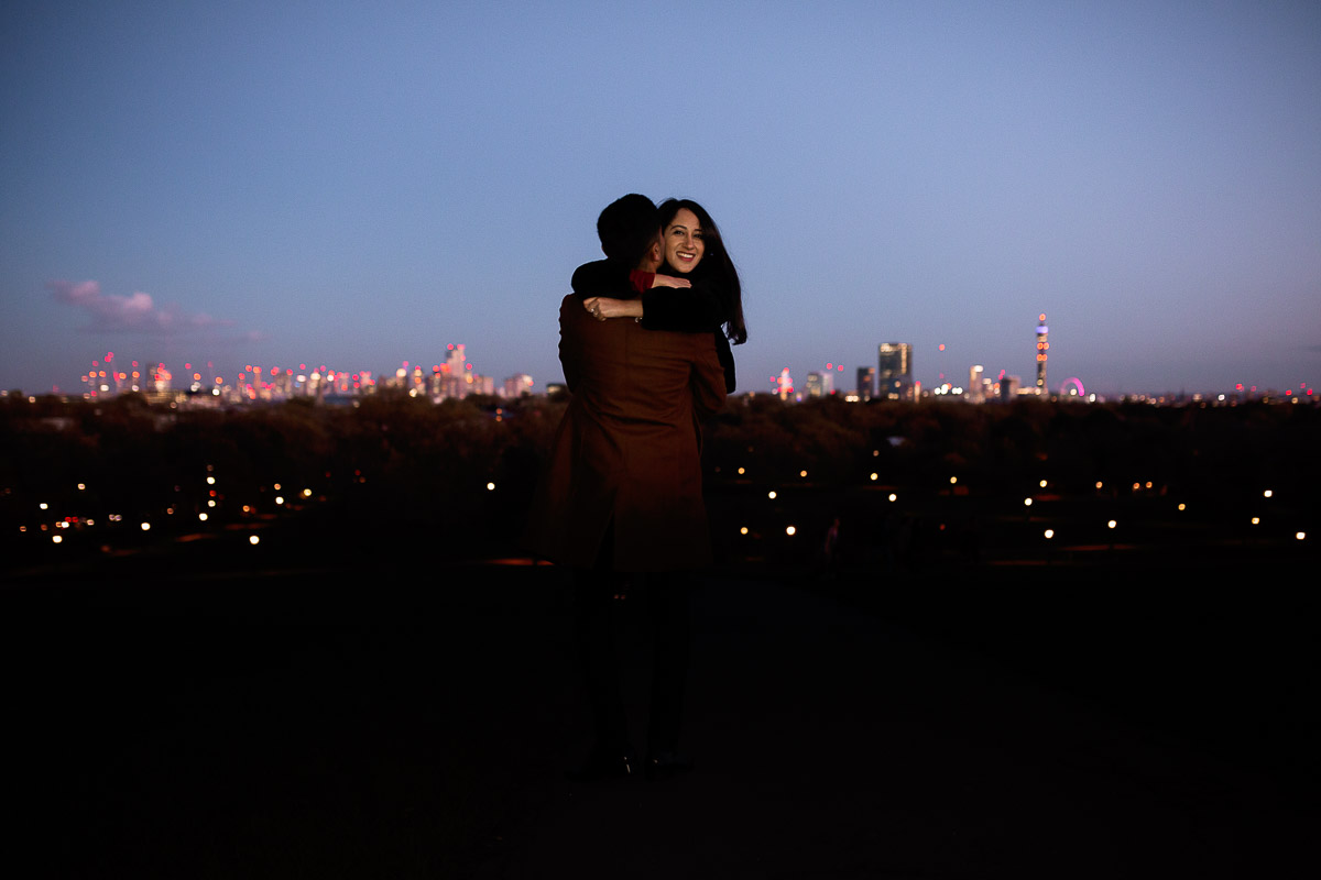 london view at night at primrose hill surprise marriage proposal in london